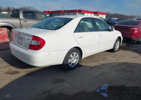 2002 Toyota Camry Le from USA, damaged, VIN 4T1BE32K22U063358
